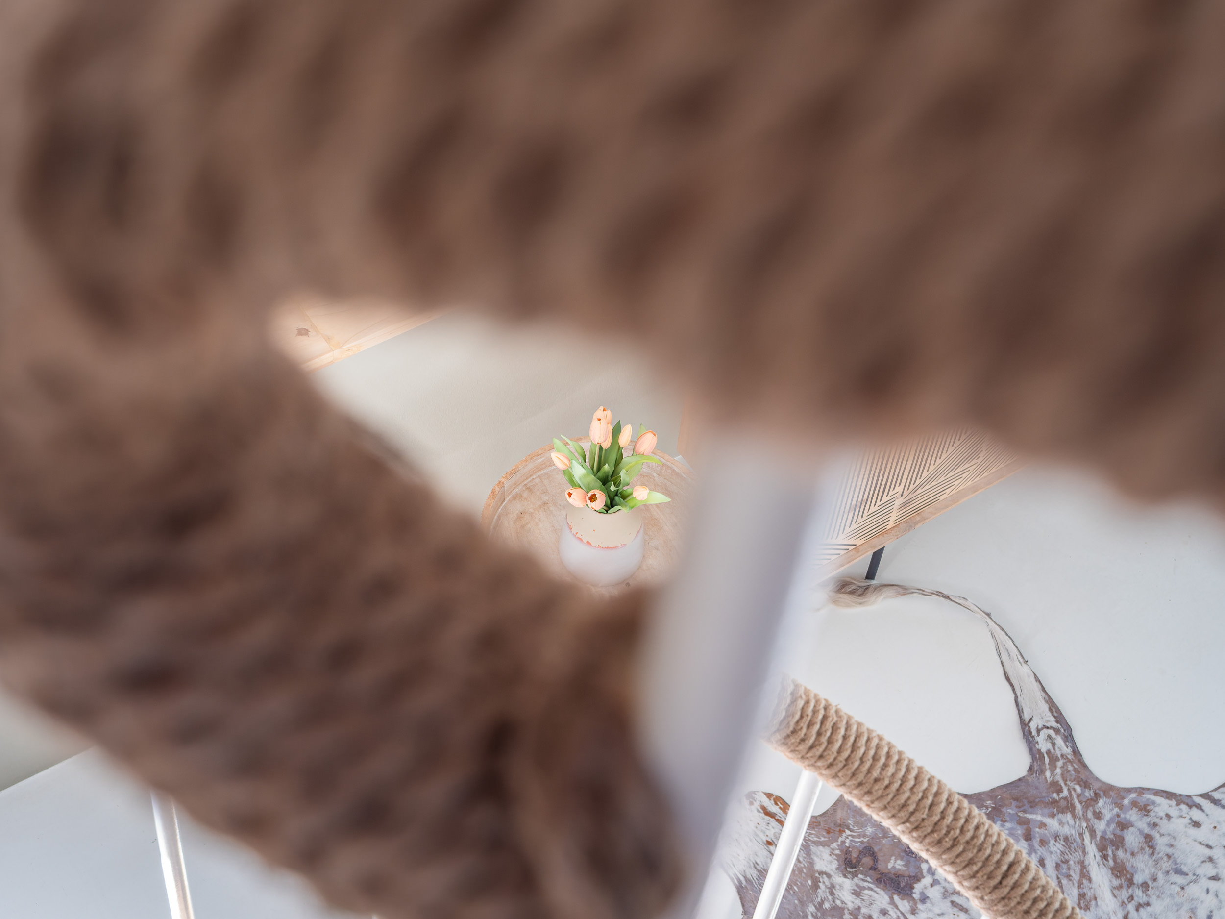 Dried flowers in a rustic vase — a quiet styling detail